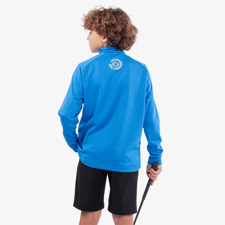 Raz is a Insulating golf mid layer for Juniors in the color Blue(4)