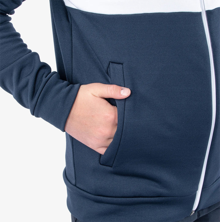 Rex is a Insulating golf mid layer for Juniors in the color Navy/White(5)