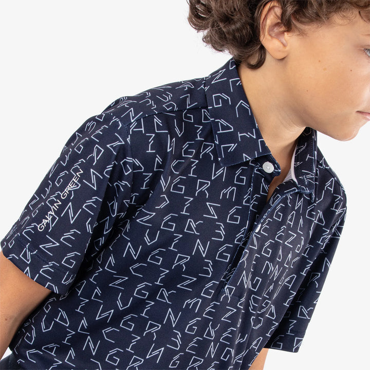Rickie is a Breathable short sleeve golf shirt for Juniors in the color Navy(4)