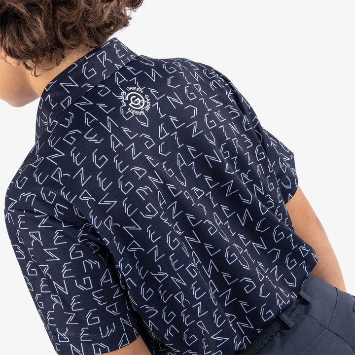 Rickie is a Breathable short sleeve golf shirt for Juniors in the color Navy(7)