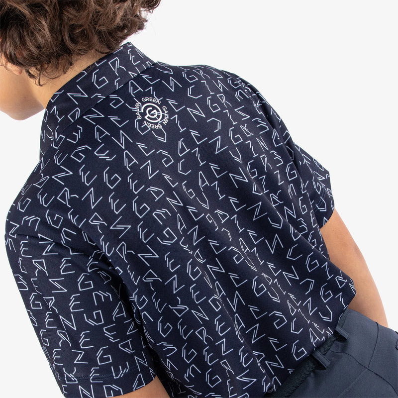 Rickie is a Breathable short sleeve golf shirt for Juniors in the color Navy(7)