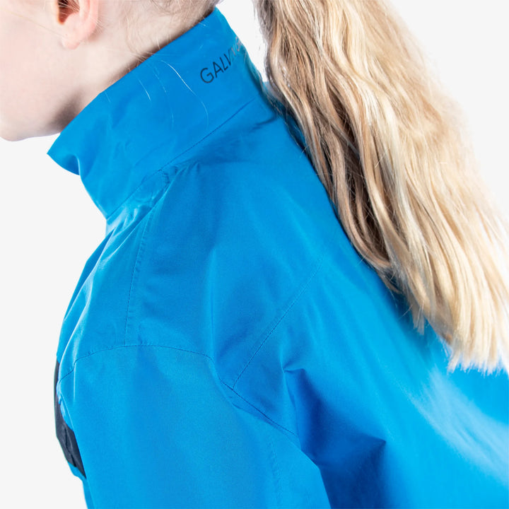 Robert is a Waterproof golf jacket for Juniors in the color Blue/Navy(8)