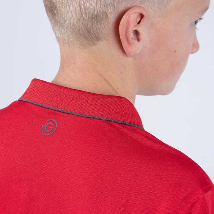 Rod is a Breathable short sleeve golf shirt for Juniors in the color Red(3)