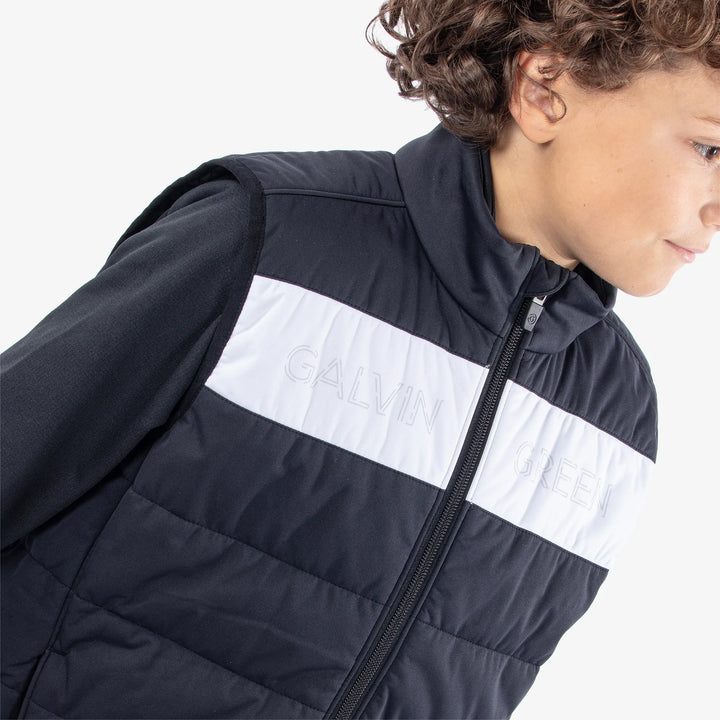 Ronie is a Windproof and water repellent golf vest for Juniors in the color Black/White(4)