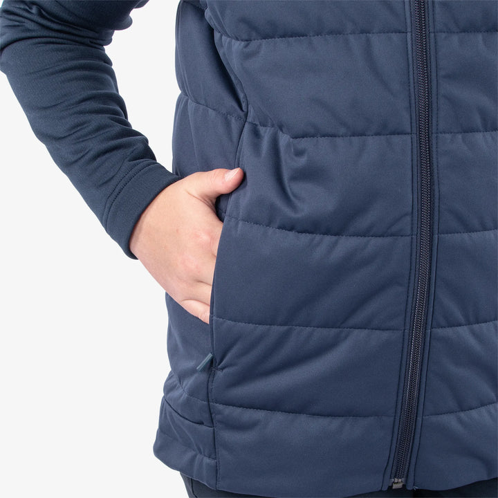 Ronie is a Windproof and water repellent golf vest for Juniors in the color Navy/White(5)