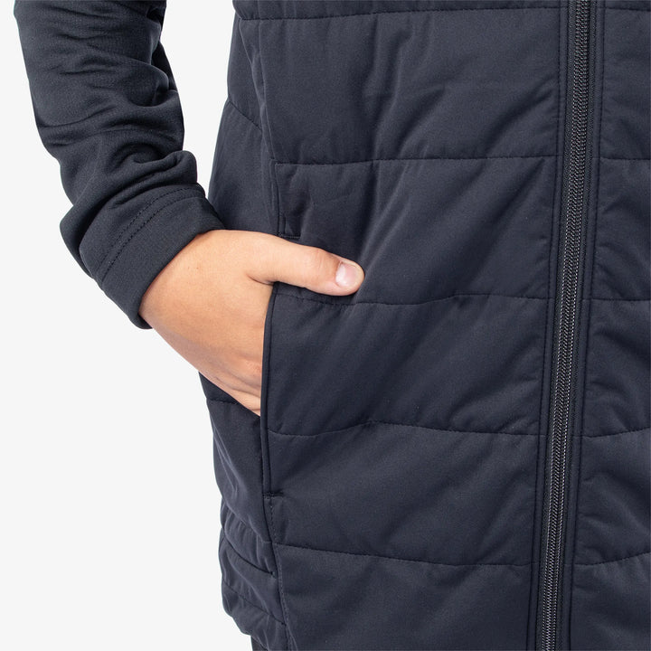 Ronie is a Windproof and water repellent golf vest for Juniors in the color Black/White(6)