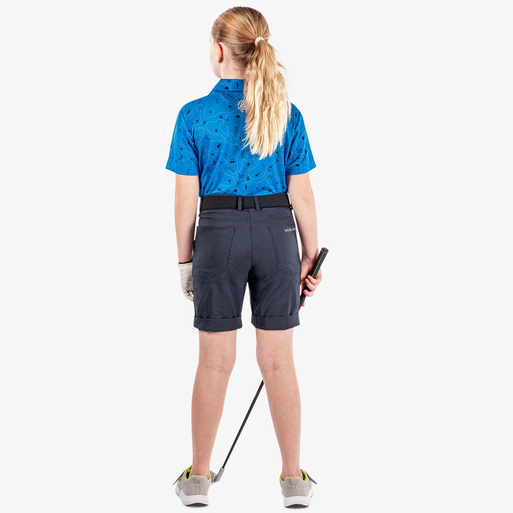 Rowan is a Breathable short sleeve golf shirt for Juniors in the color Blue/Navy(6)