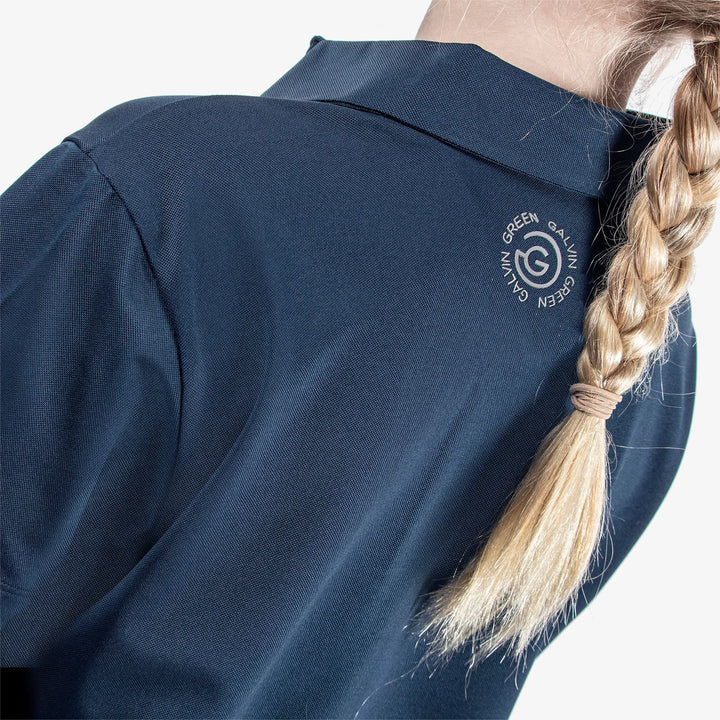 Rylan is a Breathable short sleeve golf shirt for Juniors in the color Navy(5)