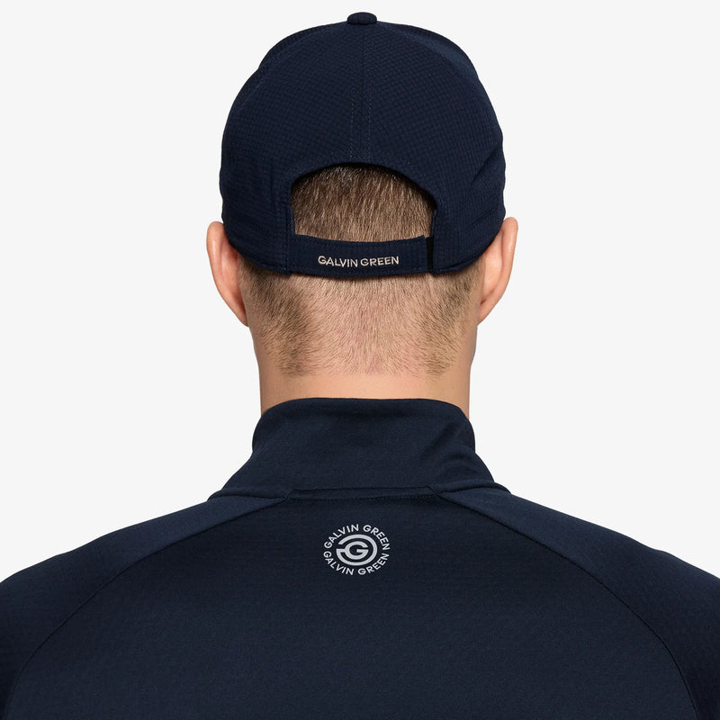 Shane is a Breathable golf hat in the color Sand/Navy(3)