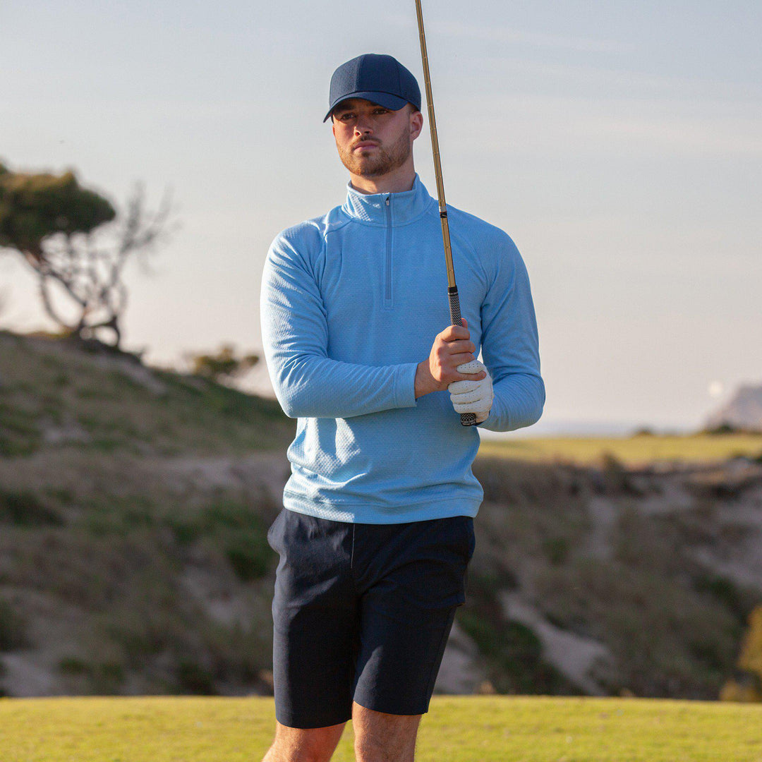 Dion is a Insulating golf mid layer for Men in the color Alaskan Blue Melange(8)