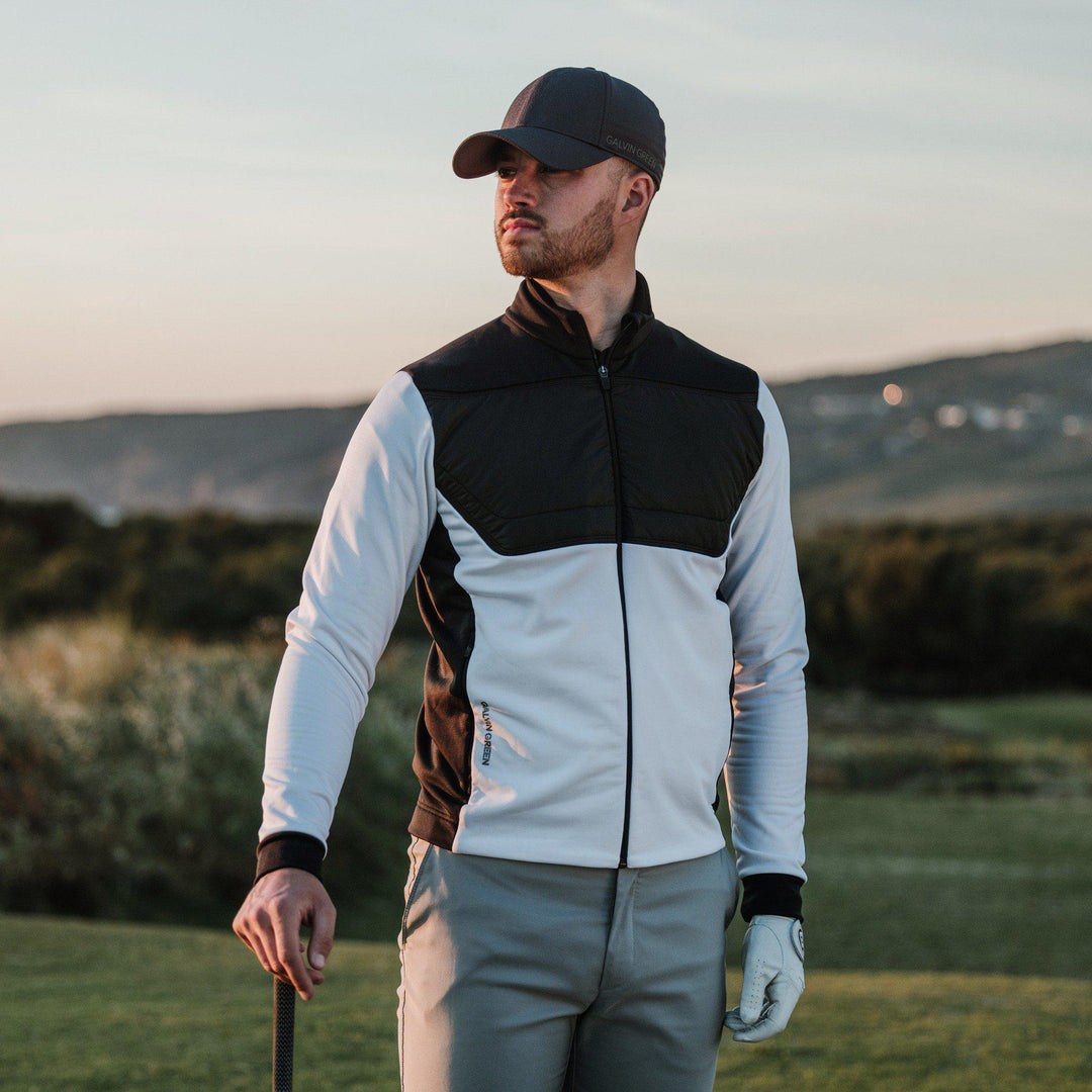 Dylan is a Insulating golf mid layer for Men in the color White/Black(9)