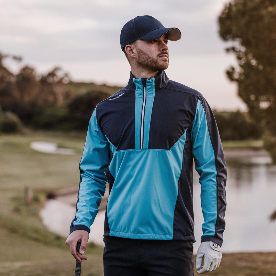 Lawrence is a Windproof and water repellent golf jacket for Men in the color Aqua/Navy(8)