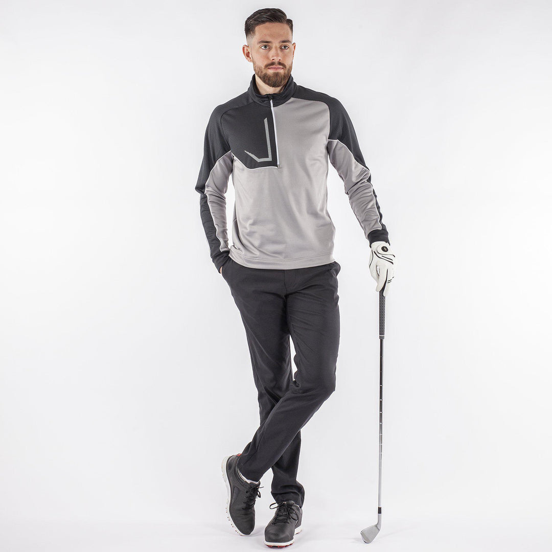 Daxton is a Insulating golf mid layer for Men in the color Fantastic Black(5)