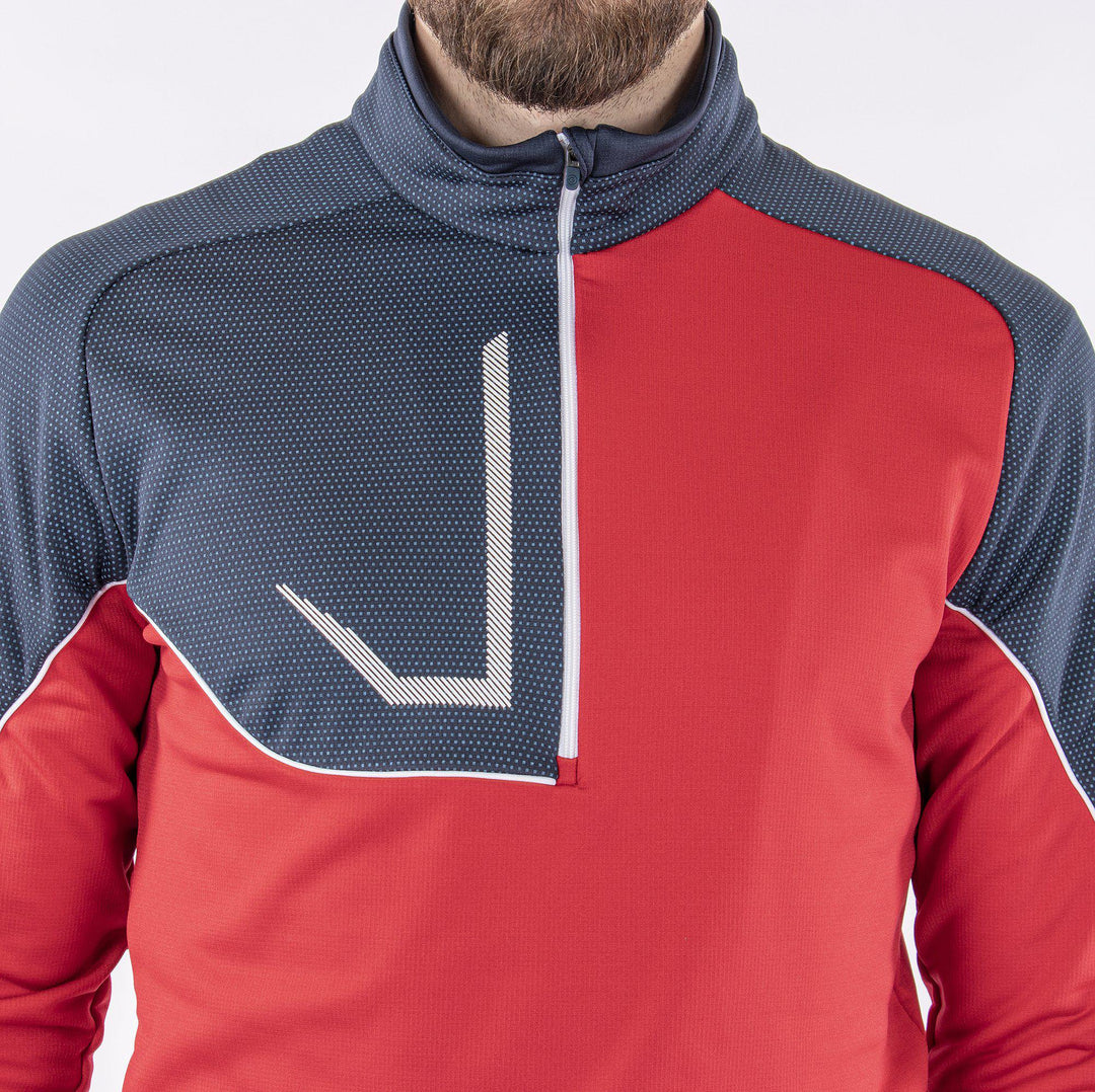 Daxton is a Insulating golf mid layer for Men in the color Sporty Red(5)