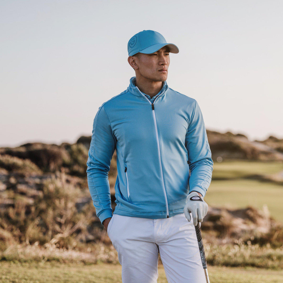 Dawson is a Insulating golf mid layer for Men in the color Alaskan Blue/White(9)