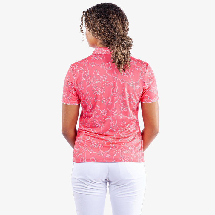 Mallory is a Breathable short sleeve golf shirt for Women in the color Camelia Rose/White(4)