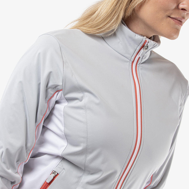 Larissa is a Windproof and water repellent jacket for  in the color Cool Grey/White/Coral(4)
