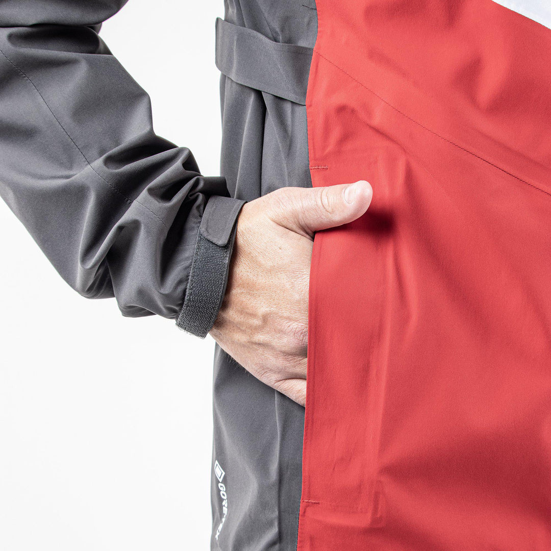 Armstrong is a Waterproof jacket for  in the color Forged Iron/Red/White (6)