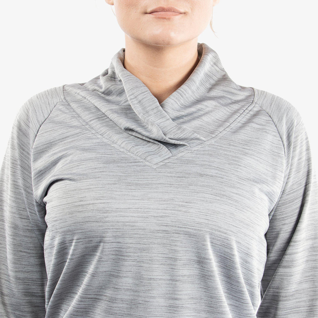 Dorali is a Insulating golf mid layer for Women in the color Cool Grey(4)