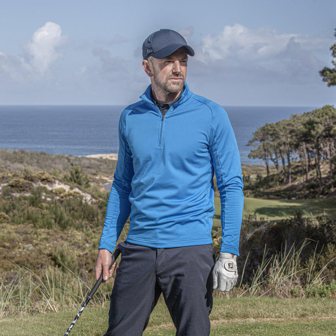 Drake is a Insulating golf mid layer for Men in the color Blue(9)