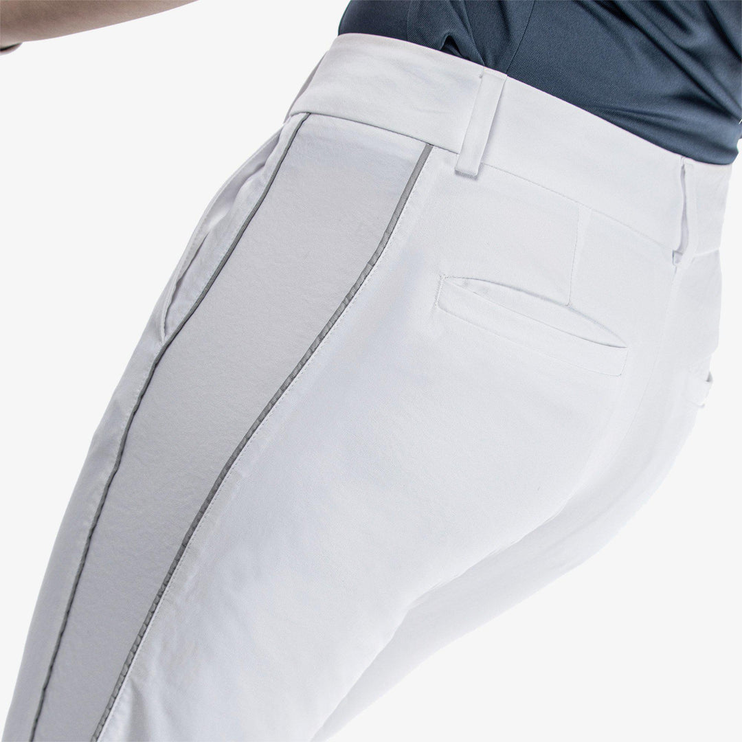 Nicole is a Breathable golf pants for Women in the color White/Cool Grey(6)