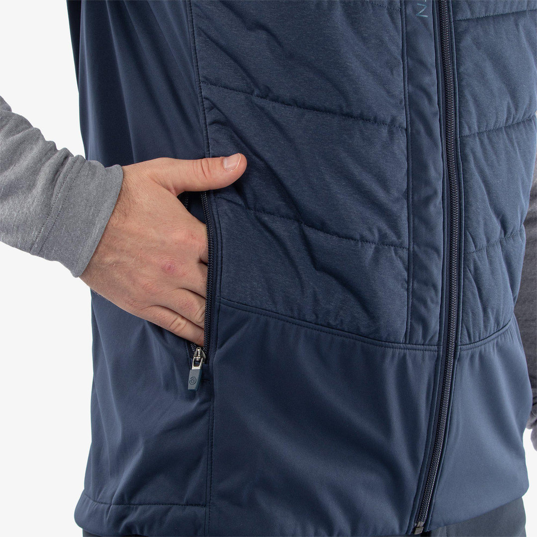 Lauro is a Windproof and water repellent vest for  in the color Navy(5)
