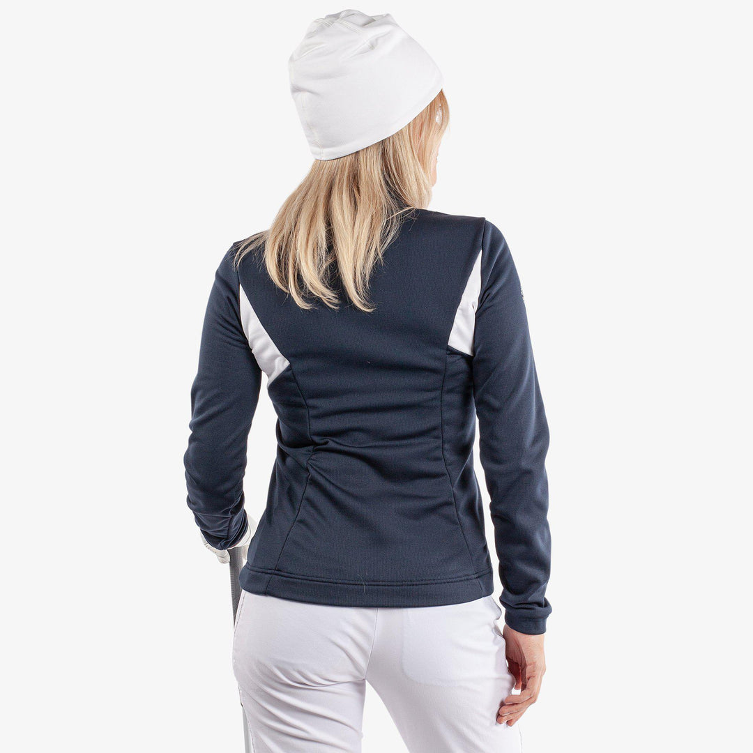 Destiny is a Insulating golf mid layer for Women in the color Navy/White(4)