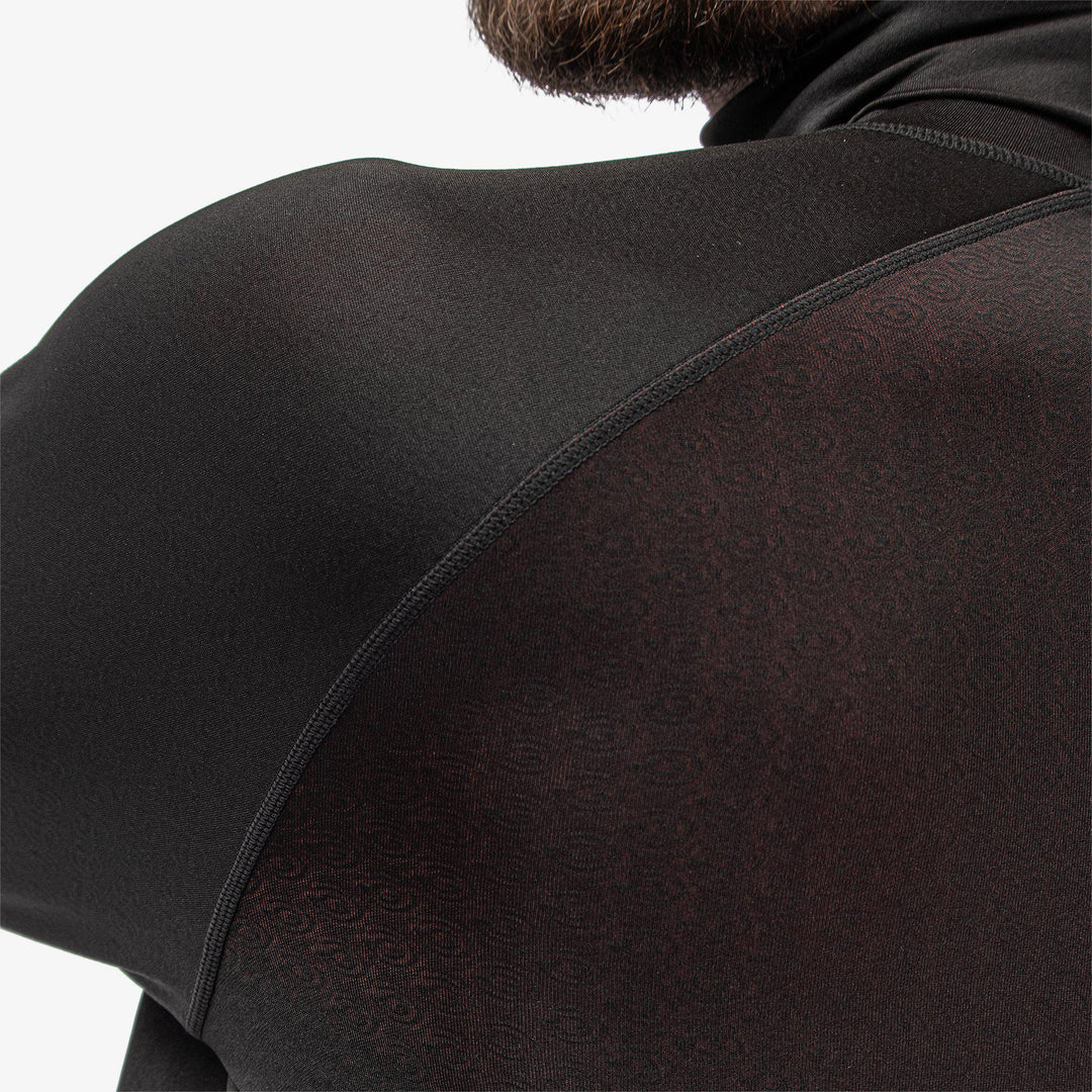 Edwin is a Thermal base layer top for  in the color Black/Red(10)