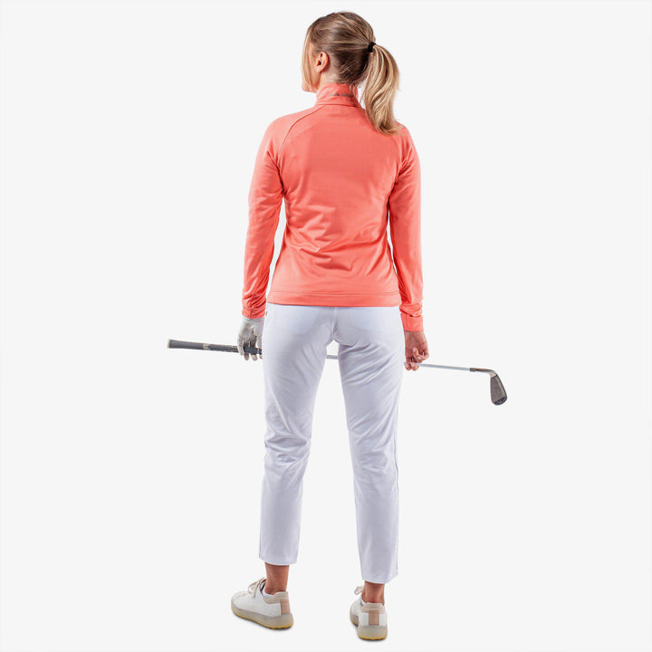 Dolly is a Insulating golf mid layer for Women in the color Coral(7)
