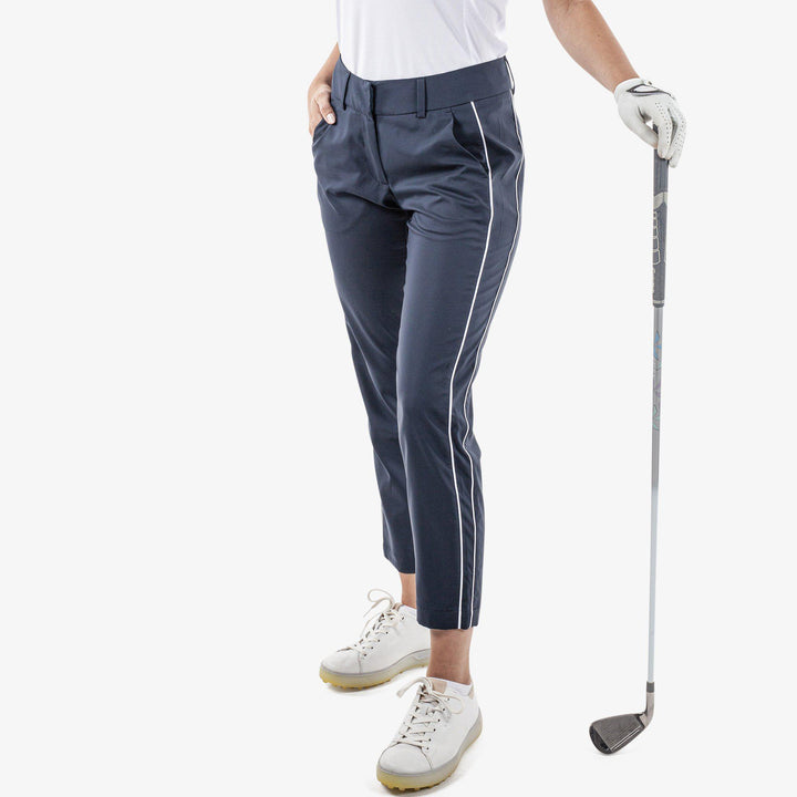 Nicole is a Breathable golf pants for Women in the color Navy/White(1)
