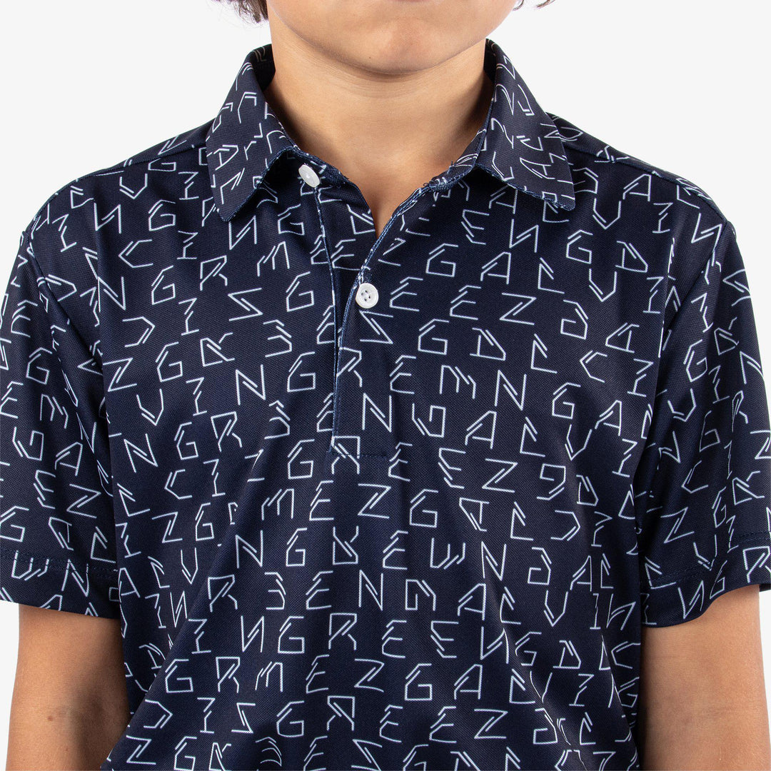 Rickie is a Breathable short sleeve golf shirt for Juniors in the color Navy(5)