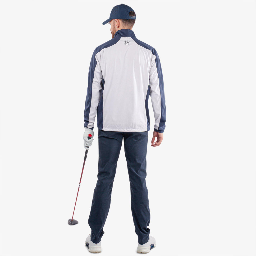 Lawrence is a Windproof and water repellent golf jacket for Men in the color White/Navy(6)