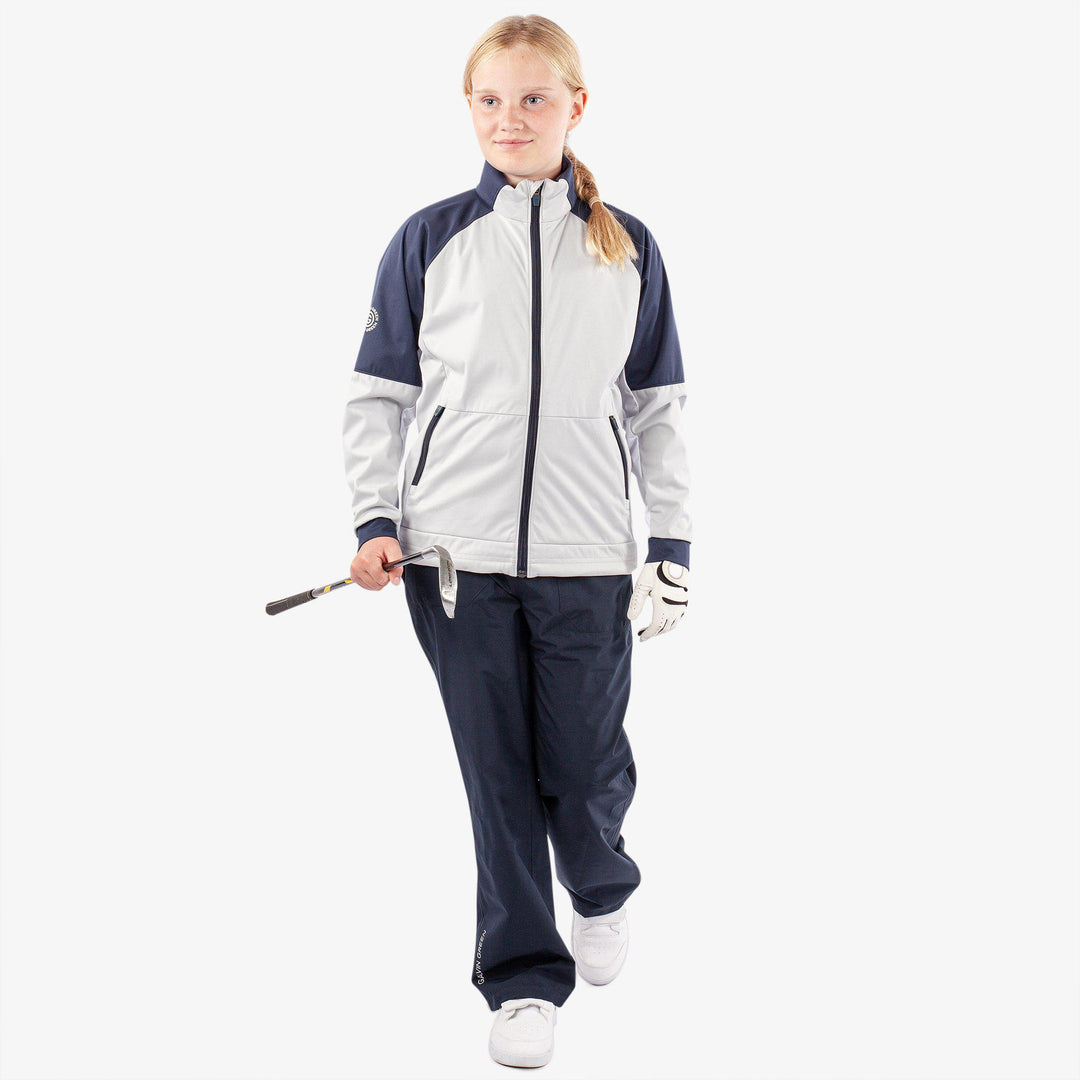 Remi is a Windproof and water repellent jacket for  in the color Cool Grey/Navy/White(3)
