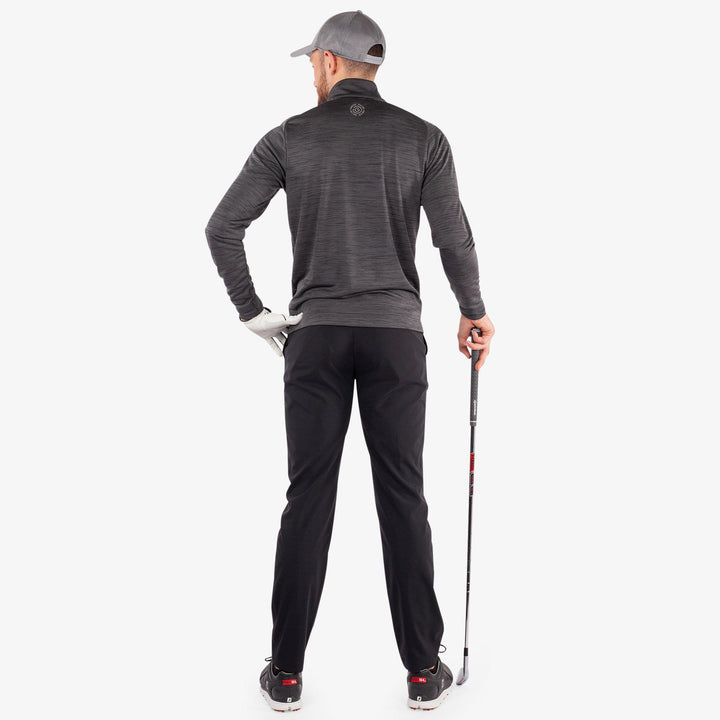Dennis is a Insulating golf mid layer for Men in the color Black(4)