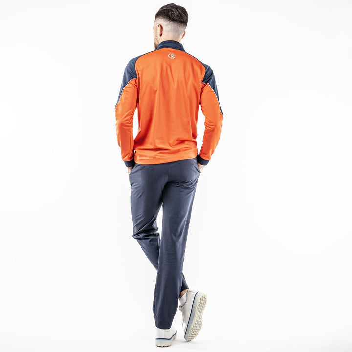 Daxton is a Insulating golf mid layer for Men in the color Orange(7)