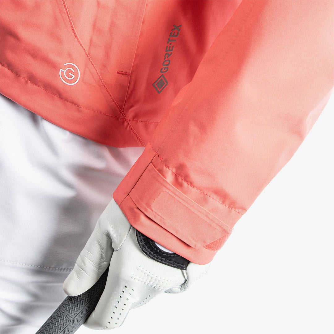 Aida is a Waterproof jacket for  in the color Coral/White/Cool Grey(6)