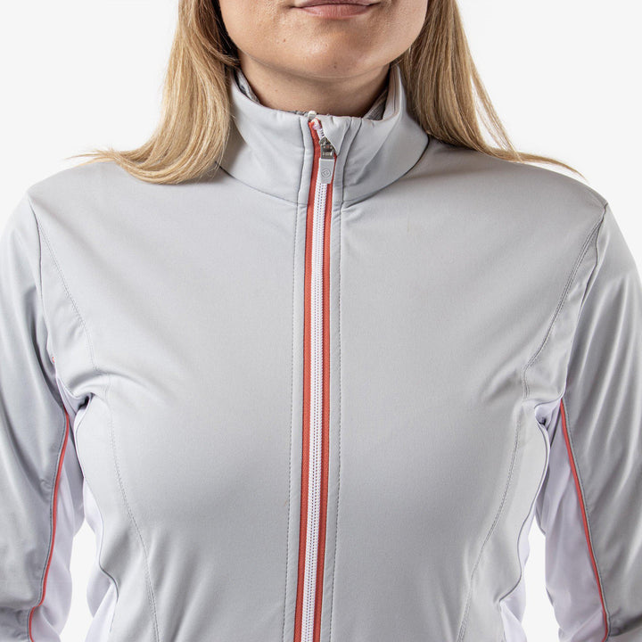 Larissa is a Windproof and water repellent golf jacket for Women in the color Cool Grey/White/Coral(3)