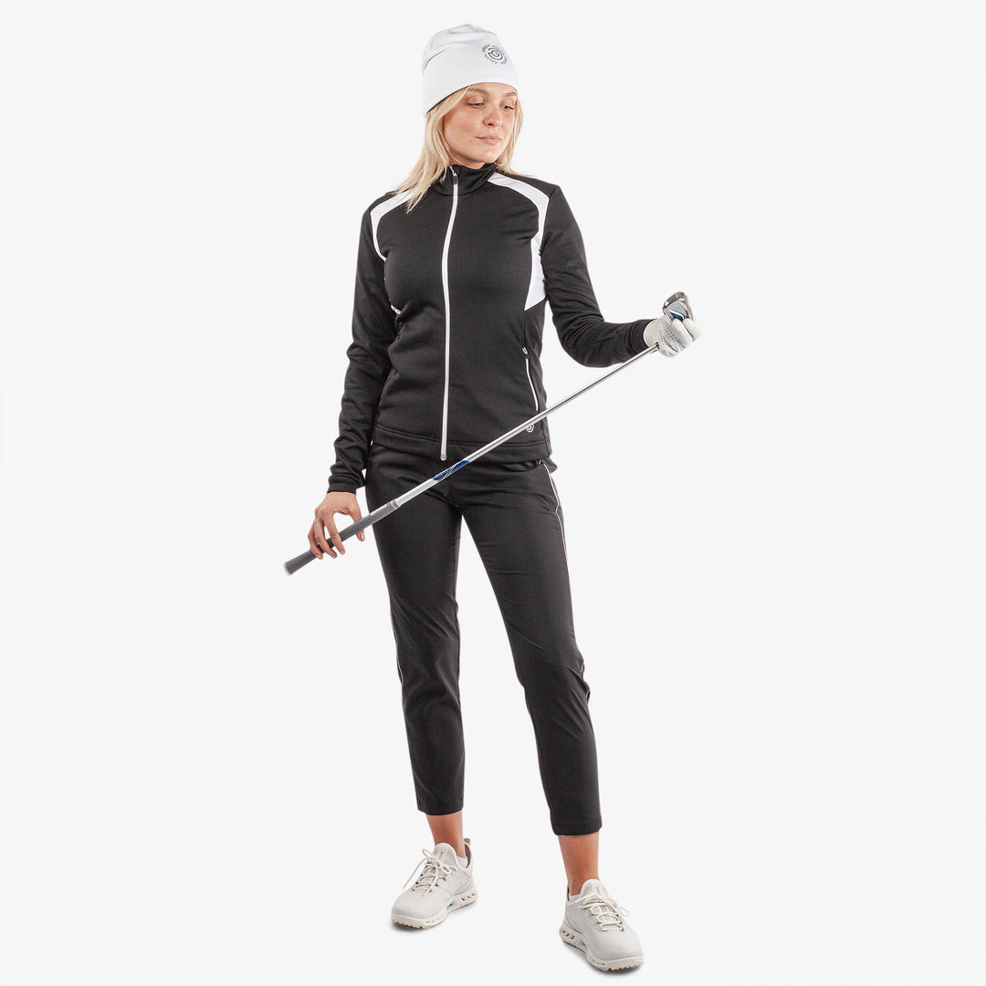 Destiny is a Insulating golf mid layer for Women in the color Black/White(2)