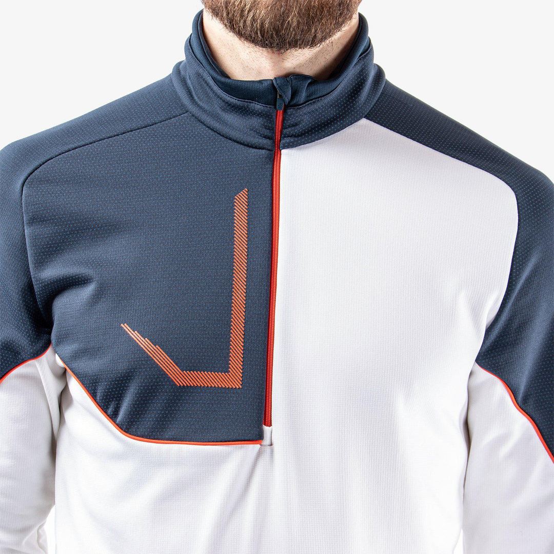 Daxton is a Insulating golf mid layer for Men in the color White/Navy/Orange(3)
