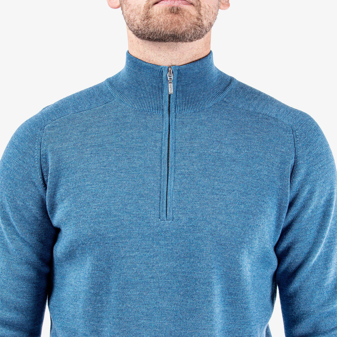 Chester is a Merino golf sweater for Men in the color Blue Melange (4)