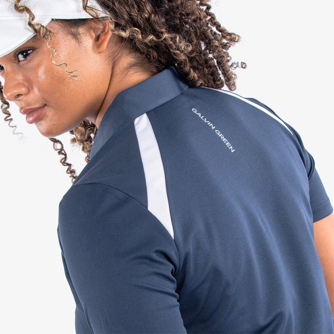 Mirelle is a Breathable short sleeve golf shirt for Women in the color Navy/White(5)