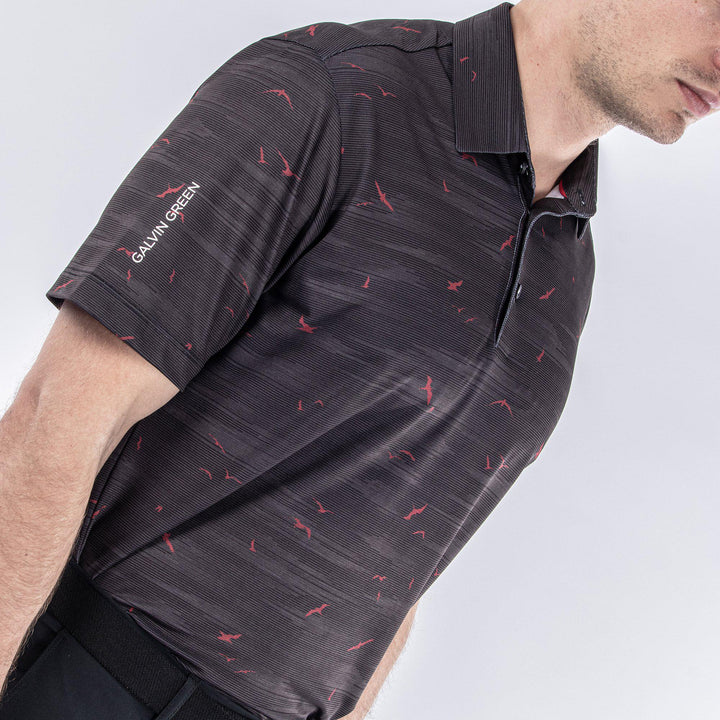 Marin is a Breathable short sleeve golf shirt for Men in the color Black/Red(3)