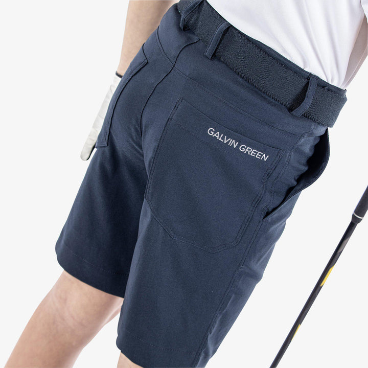 Raul is a Breathable golf shorts for Juniors in the color Navy(7)