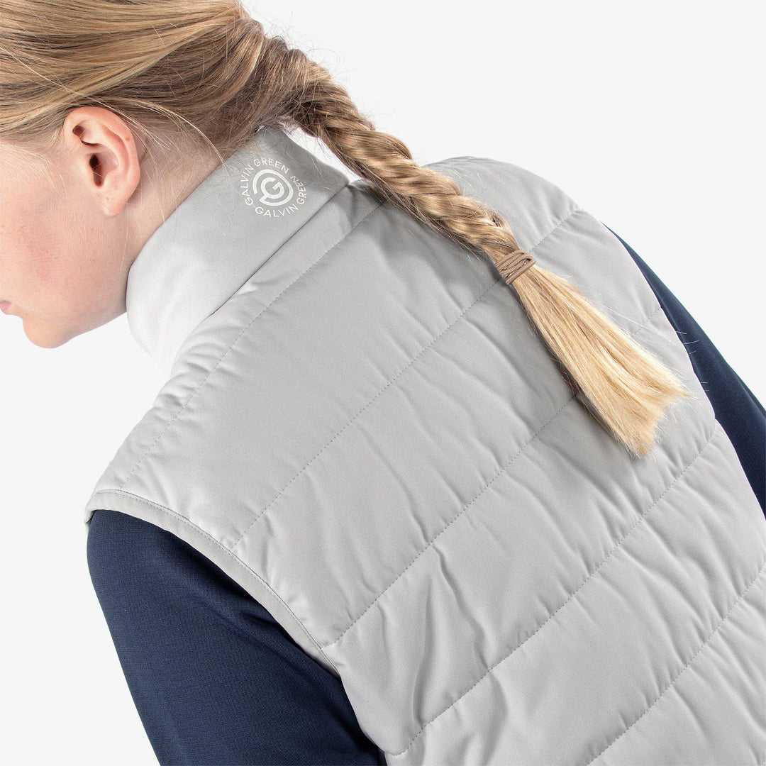 Ronie is a Windproof and water repellent golf vest for Juniors in the color Cool Grey/White(7)