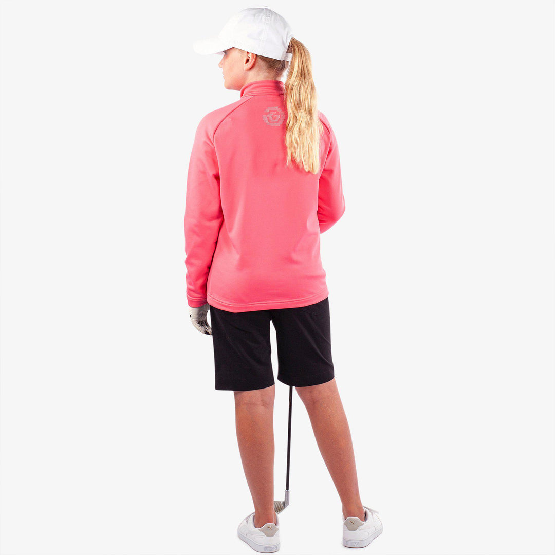 Raz is a Insulating golf mid layer for Juniors in the color Camelia Rose(6)