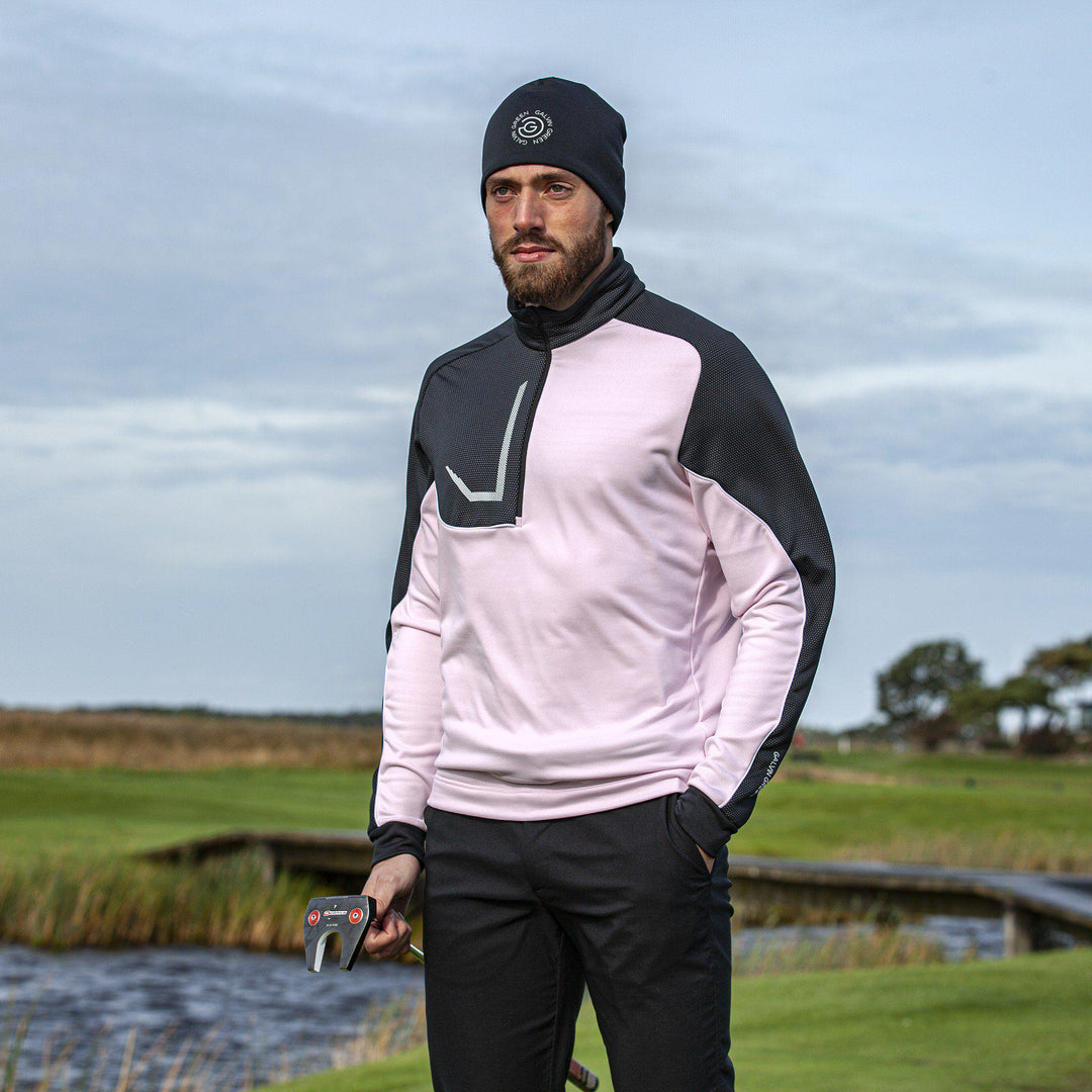 Daxton is a Insulating golf mid layer for Men in the color Fantastic Pink(3)