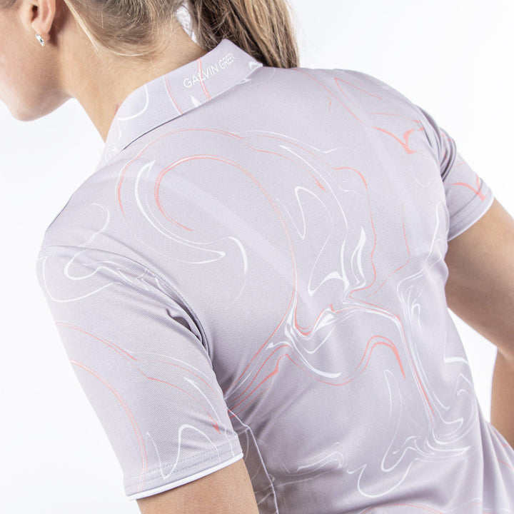 Malena is a Breathable short sleeve golf shirt for Women in the color Cool Grey/Coral/White(5)