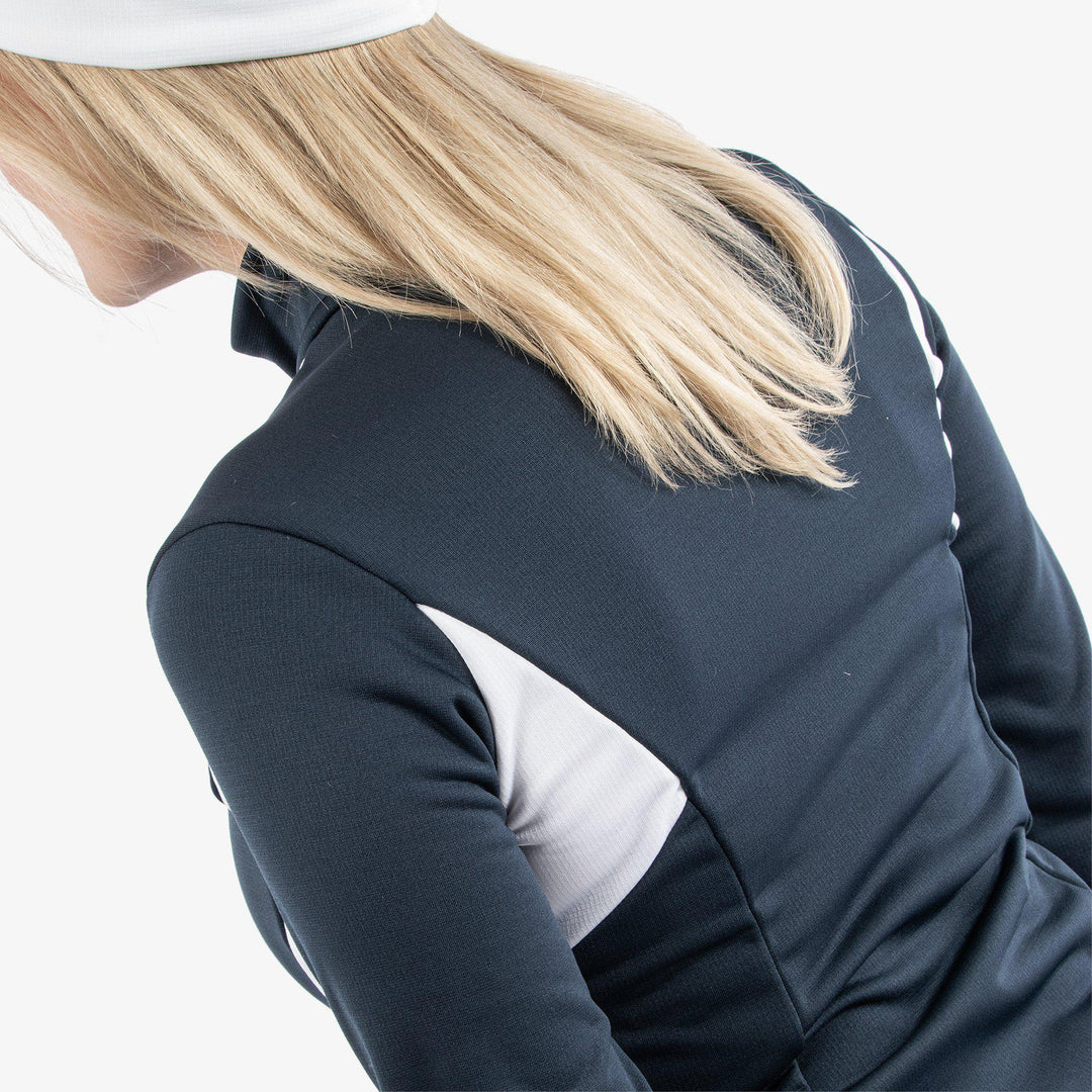 Destiny is a Insulating golf mid layer for Women in the color Navy/White(5)