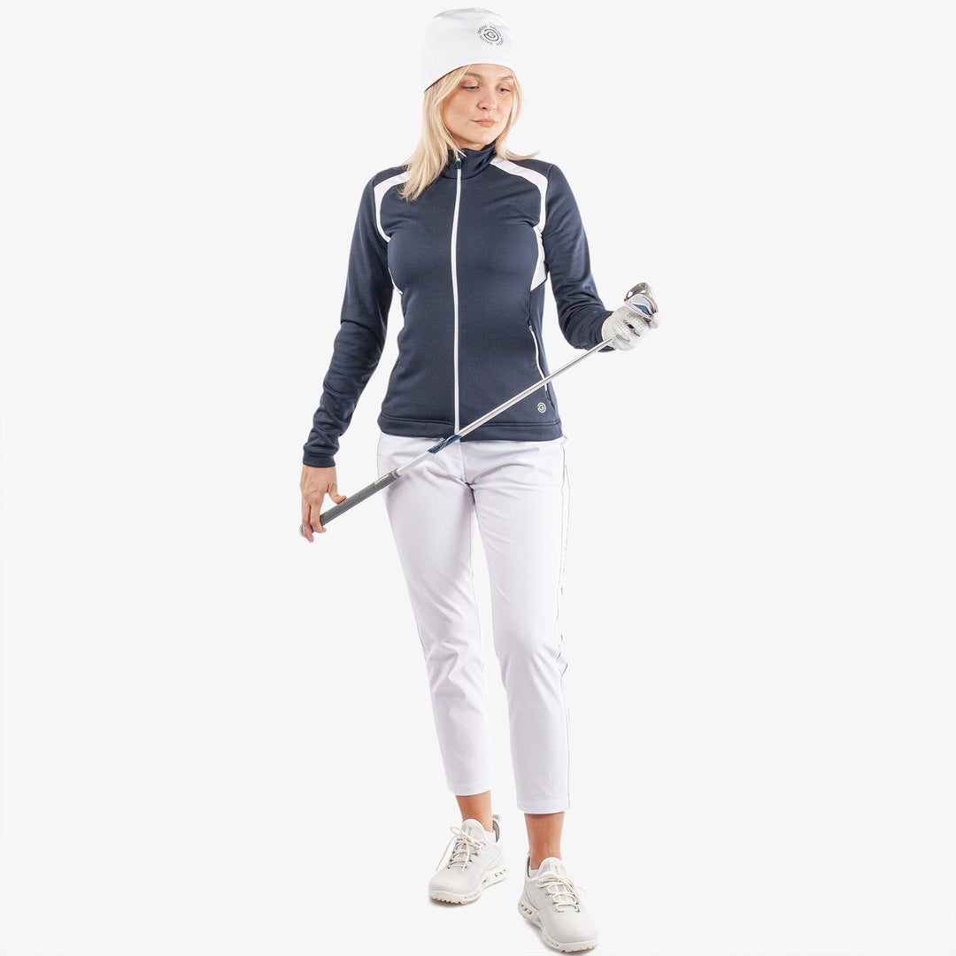 Destiny is a Insulating golf mid layer for Women in the color Navy/White(2)