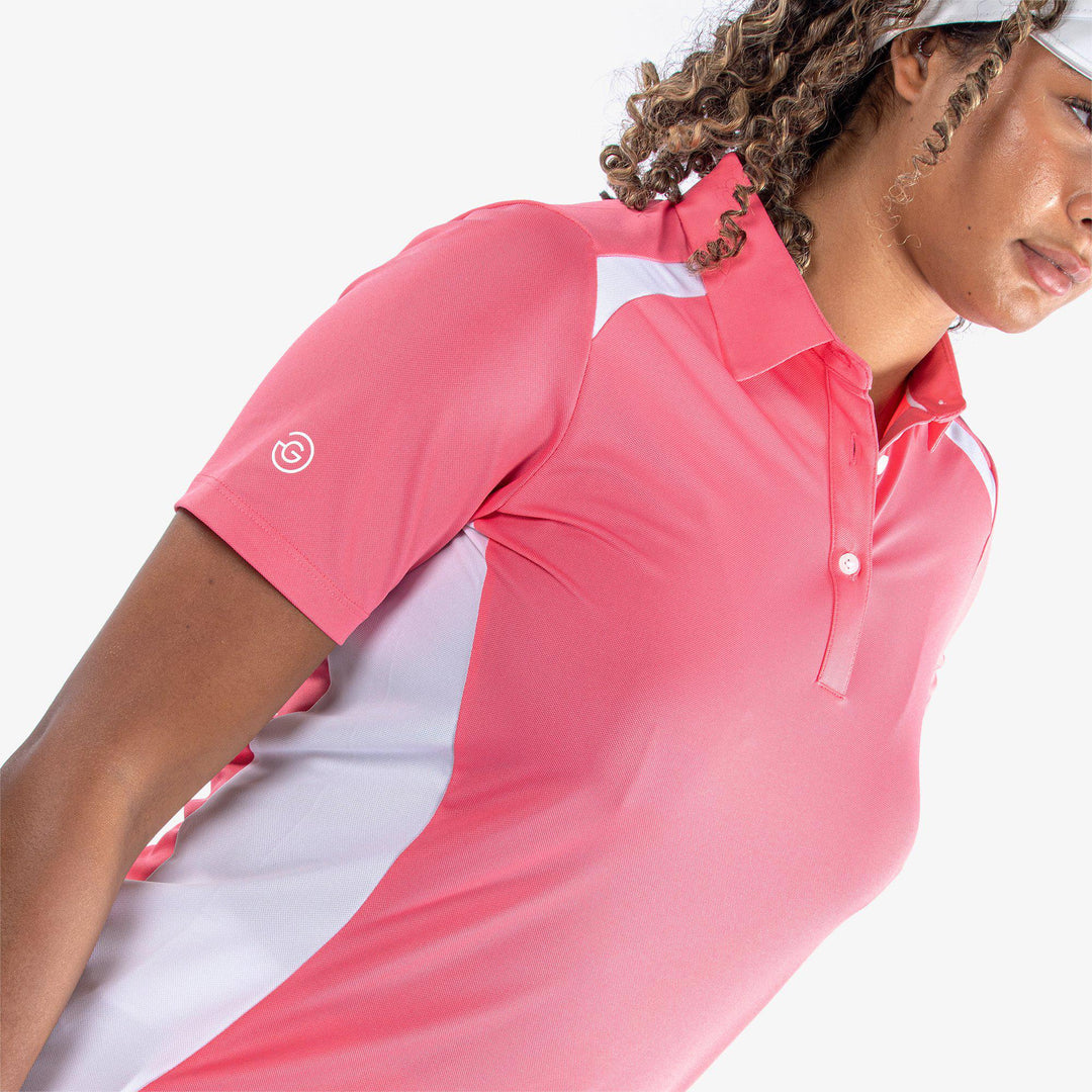 Mirelle is a Breathable short sleeve golf shirt for Women in the color Camelia Rose/White(3)